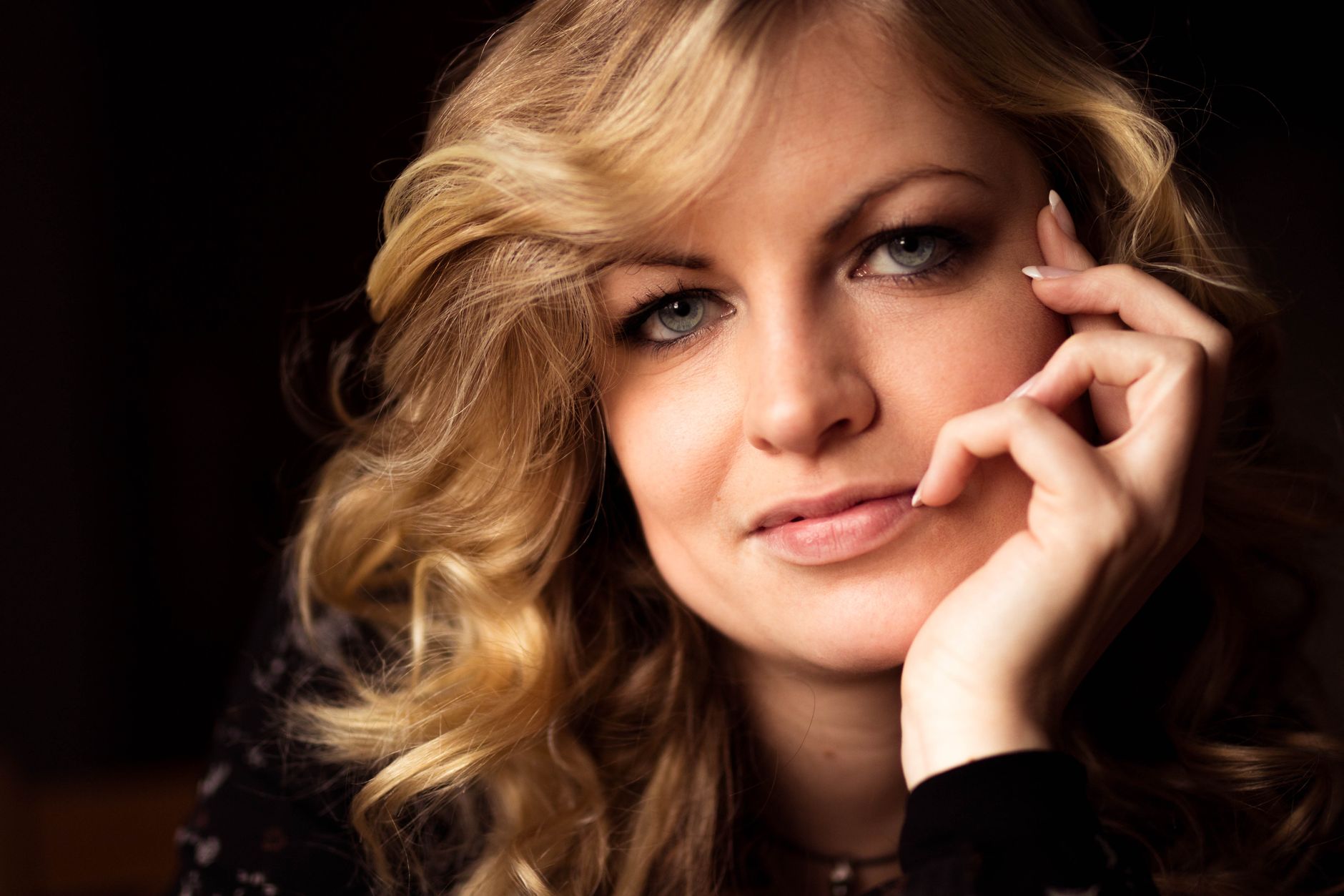 Close portrait of a woman with blonde hair